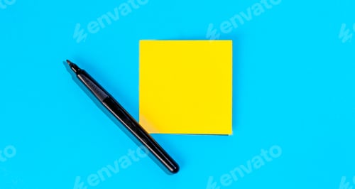 Preview: Yellow note with empty place for text with marker on blue background, flat lay.