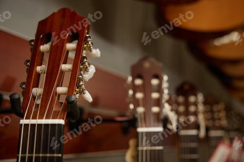 Preview: Detailed closeup of the headstock of an acoustic guitar