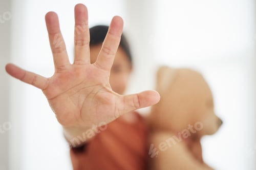 Preview: Hand, child and palm with stop for violence, abuse and warning sign in support for harassment and p