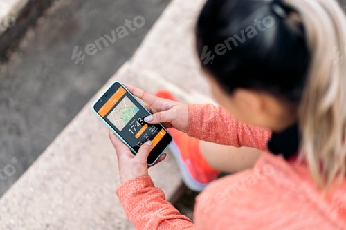 Preview: Fitness Woman Using her Phone
