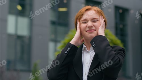 Preview: Close up stressed overworked fatigued young Caucasian redhead nervous businesswoman female woman