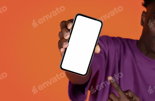 Preview: Black man holding cell phone with blank screen, mockup