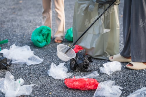 Preview: Women are helping to collect separate garbage, focusing on plastic waste management.sort plastic