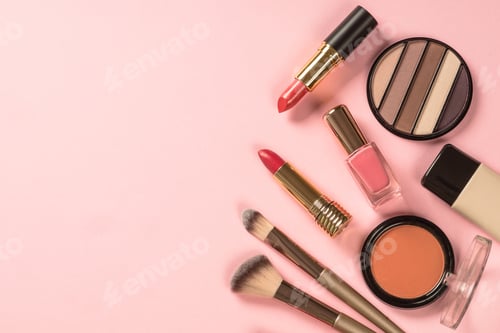 Preview: Make up products at pink background top view.