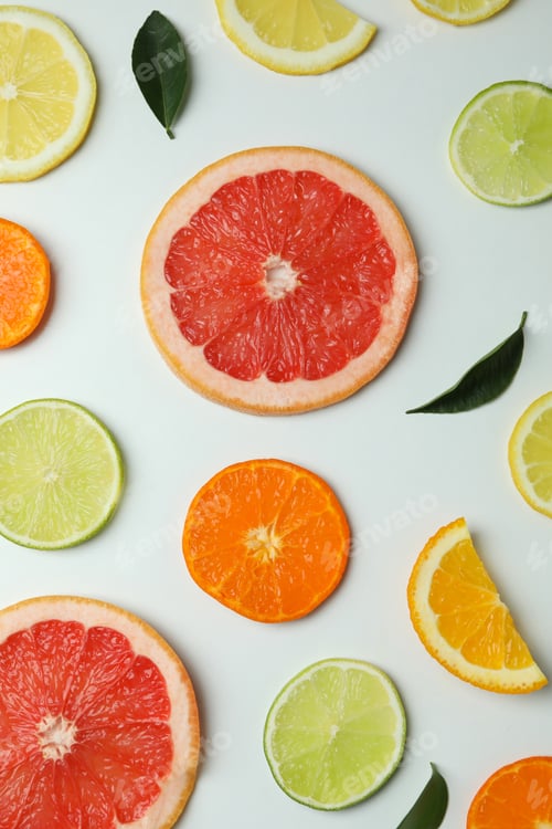 Preview: Flat lay with citrus slices on white background