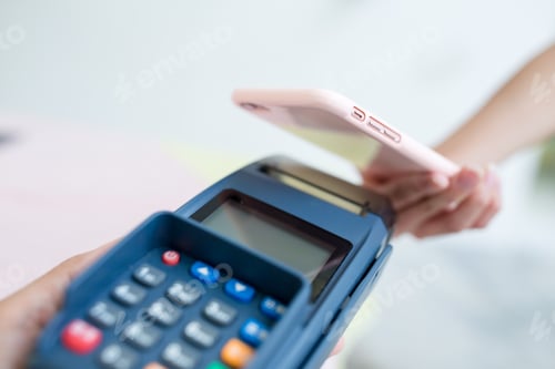 Preview: Customer paying with NFC technology