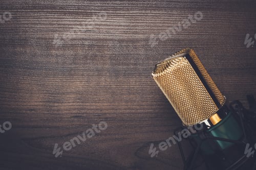 Preview: vintage condensing microphone on the wooden background