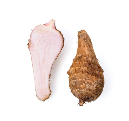 Preview: fresh taro root isolated on white background. top view