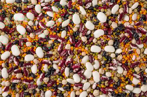 Preview: Mix of legumes, chickpeas, lentils and beans on a gray concrete background. Top view. Copy space.