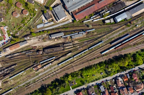 Preview: Aerial drone view of old locomotive train depo, parking iron horses on railway routes. Diesel engine