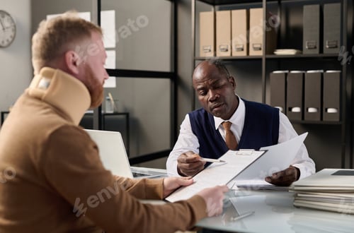 Preview: Business Meeting with Man Wearing a Neck Brace