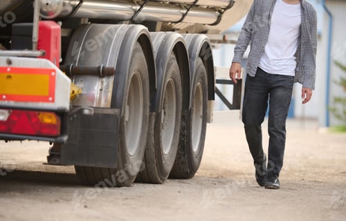 Preview: Young truck driver in casual clothes