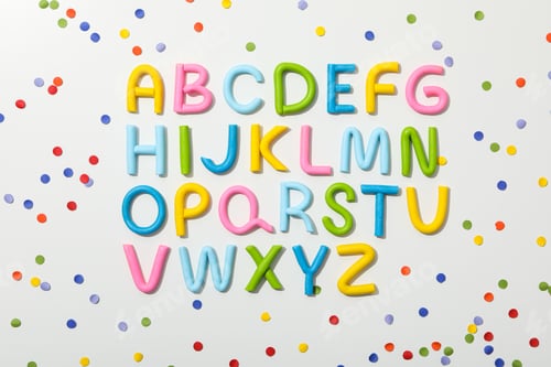 Preview: Alphabet made of colored plasticine on a light background.