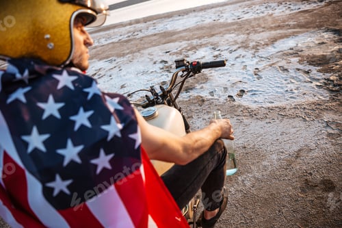 Preview: Close up portrait of man wearing helmet and american flag