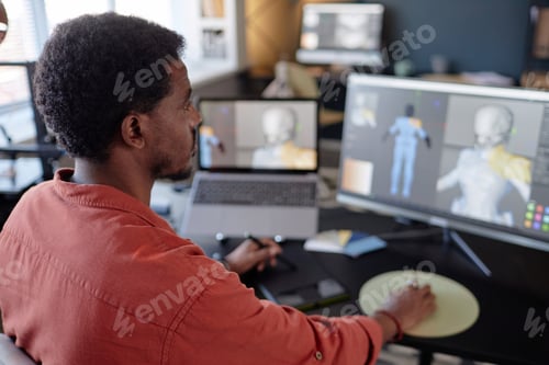 Preview: Working on 3D Animation Project in Modern Office Setting