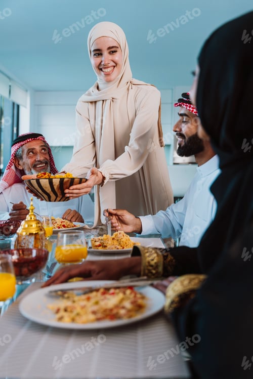 Preview: Arab family enjoying traditional meal together during ramadan