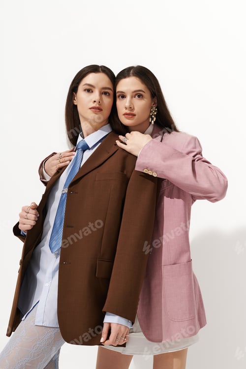 Preview: Stylish twin sisters expressing their bond through fashion and elegance in a creative setting