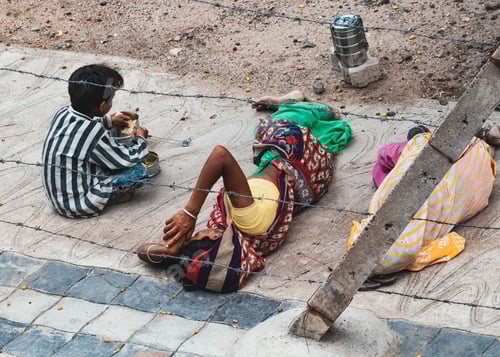 Preview: Back view of three children lying on floor outdoor