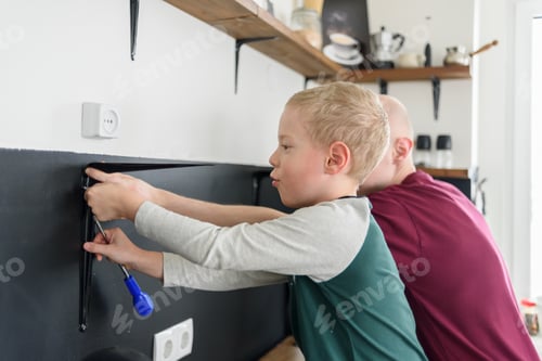 Preview: Father and son doing house renovations