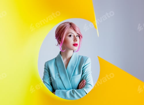 Preview: girl with pink hair and in blue jacket with yellow paper on foreground