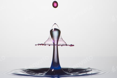 Preview: Splash of colorful liquid with high speed flash