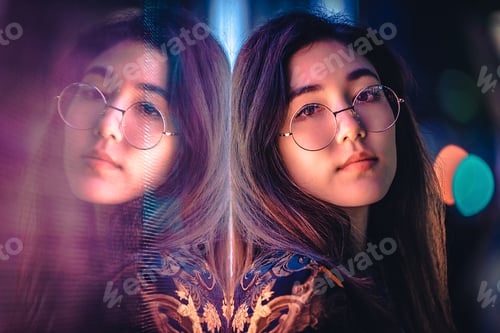 Preview: Pretty asian woman portrait with led lights