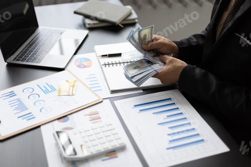 Preview: Executive Managing Finances in a Modern Office