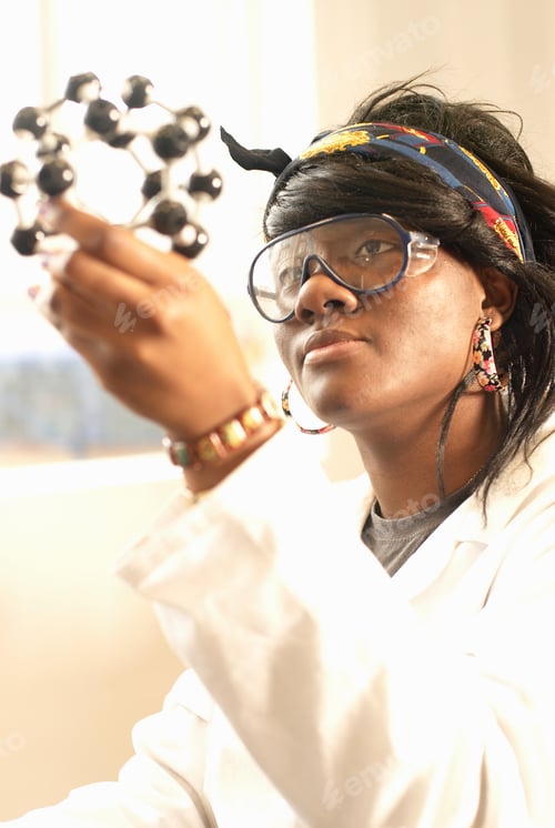 Preview: Scientist examining molecular model