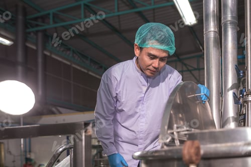 Preview: Worker Checking quality or checking stock of glass bottle in beverage factory.
