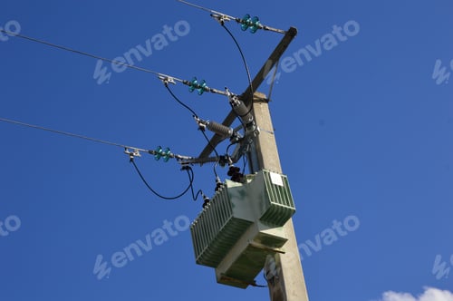 Preview: Electricity transmission tower against the blue sky