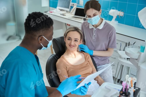 Preview: Male and female discussing results of treatment