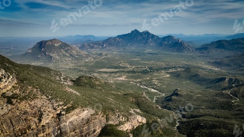 Preview: Aerial view of the vast wild landscape in Angola showcasing mountains and lush greenery