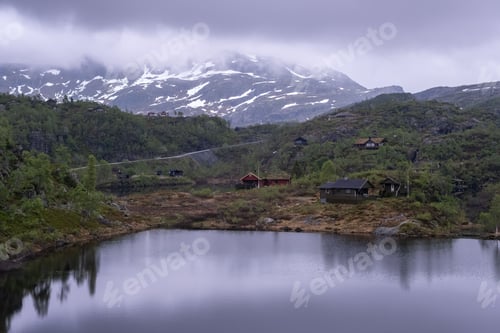 Preview: Beautiful scenery of houses with grass roof. Norwegian traditional architecture Mountains