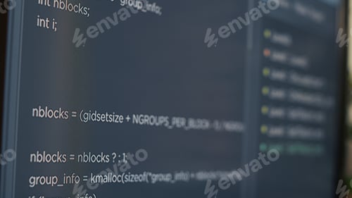 Preview: Closeup of computer screen of system engineer typing source code