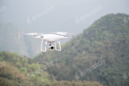 Preview: Drone dji pantom4 flying near mountain