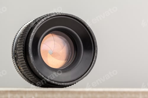 Preview: Close-up of a camera lens showcasing details of design and function