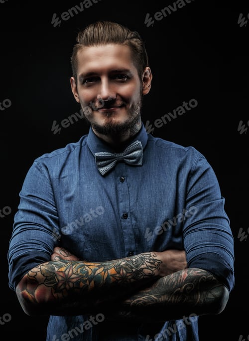 Preview: Male in blue t shirt.