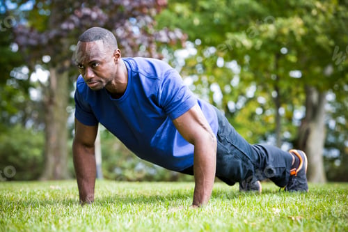 Preview: young man exercising outdoors