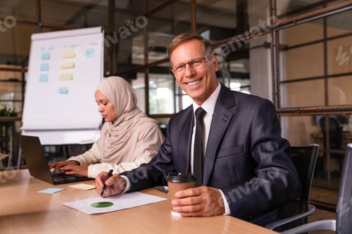 Preview: Multiethnic business team meeting in the office