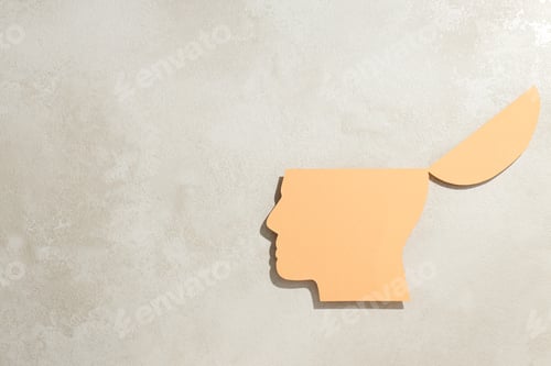 Preview: Human head made of paper on a light background