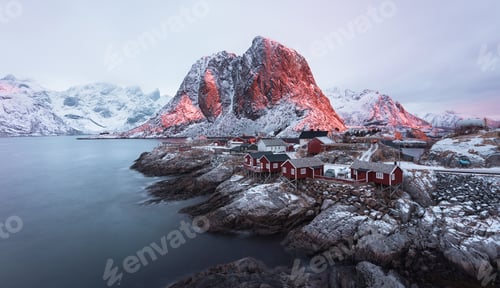 Preview: Red houses on remote shore in mountains