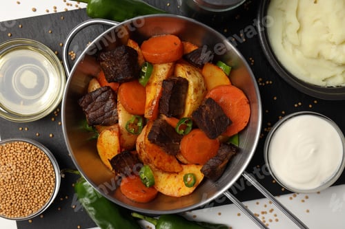 Preview: Concept of tasty food with beef with vegetables, top view