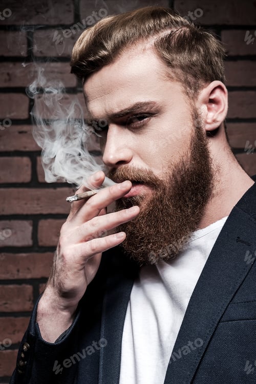Preview: Beard man smoking.