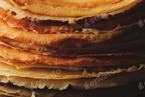 Preview: Delicious thin pancakes on whole background, close up