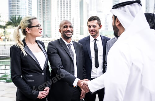 Preview: Mixed business team making agreements on future business plans