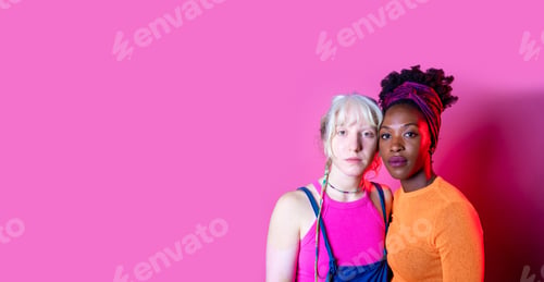 Preview: Isolated caucasian and black woman posing together for inclusion and tolerance