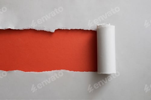 Preview: Red banner framed by a strip of torn grey paper rolled back neatly to reveal the copyspace for text