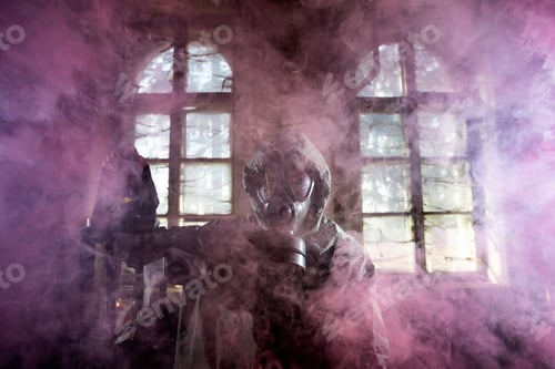 Preview: Dramatic portrait of a woman wearing a gas mask in a ruined building.