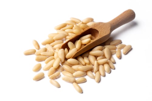 Preview: Healthy pine nuts isolated on white background.