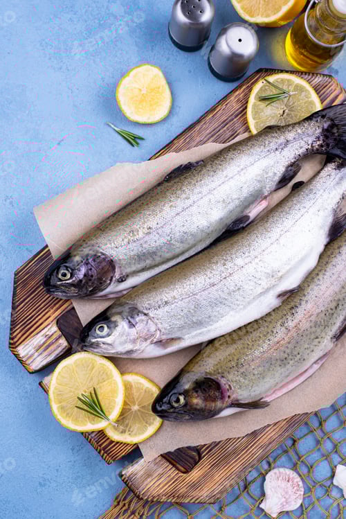 Preview: Raw uncooked trout with lemon